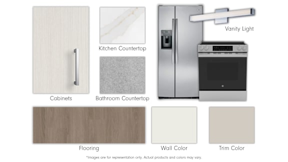 A kitchen design layout with vanity light, cabinets, and a fridge.