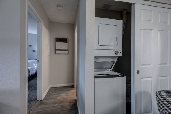 a room with a washer and dryer in it