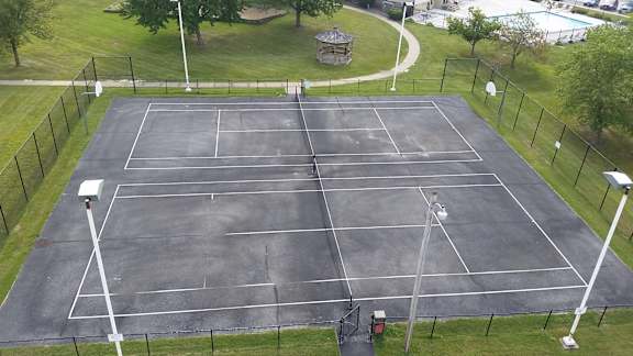 Tennis Court Aerial View at Indian Ridge Apartments, Davenport, 52807