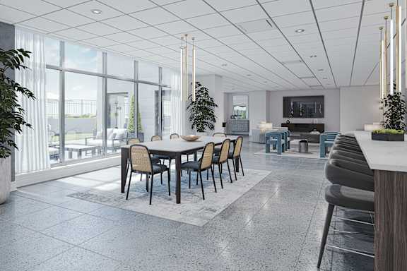 A modern dining room with a large table and chairs.