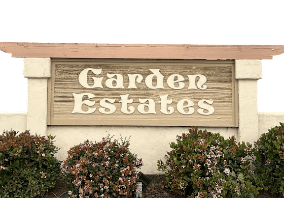 A sign that says Garden Estates is displayed.