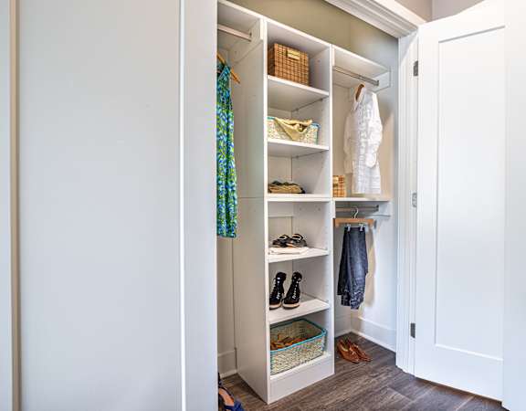 Organized closet with shelving and hanging space at Inwood at Renaissance Square Apartments, New Jersey