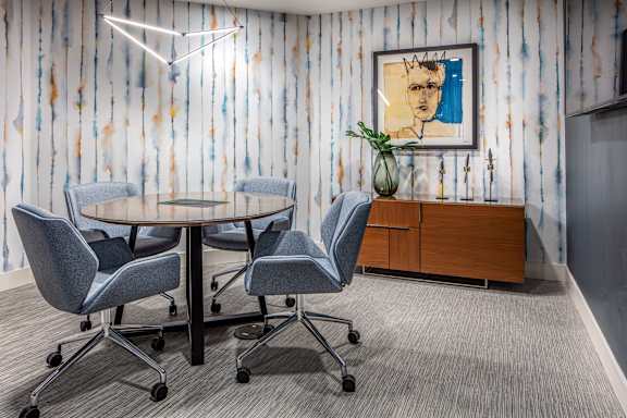 Conference room with upholstered seating and modern artwork at Inwood at Renaissance Square Apartments, Marlton, NJ