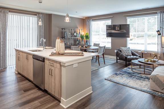 Open concept kitchen island and living area at Inwood at Renaissance Square Apartments, Marlton, New Jersey