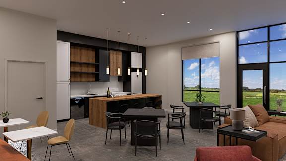A modern kitchen and dining area with a view of the outdoors.
