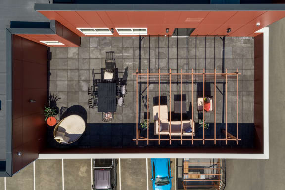a view from above of a living room with a metal grate in front of it