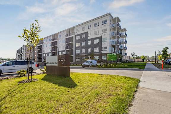 A large apartment building with a sign that says "2250 On The Park".