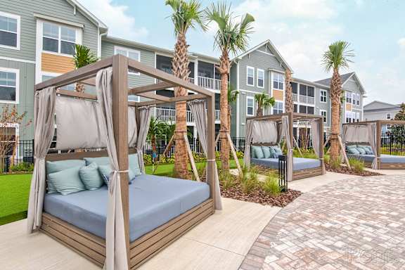 A wooden canopy bed at Standard441 Luxury Apartments, Lady Lake, Florida