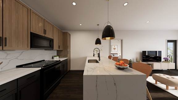 A modern kitchen with a marble countertop and wooden cabinets.