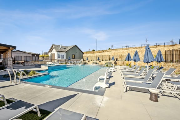 a resort style swimming pool at Citadel at Castle Pines, Castle Pines, 80108