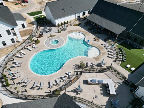 an aerial view of the pool at the resort at longboat key club at The BLVD at Wilson Crossings, Michigan