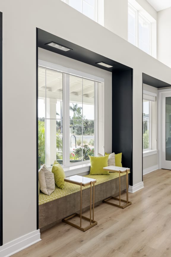 a living room with a couch and a window at Palm Grove in Ellenton, FL 34222