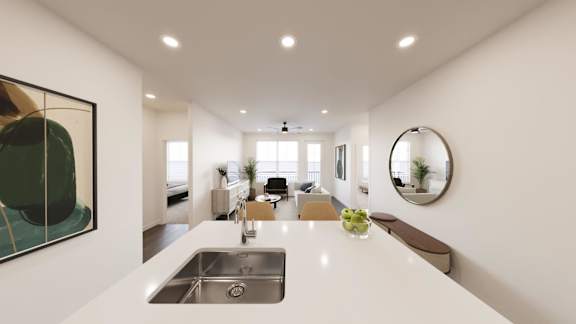 Kitchen island with view into living room at The Maverick Luxury Apartments, Monument, Colorado