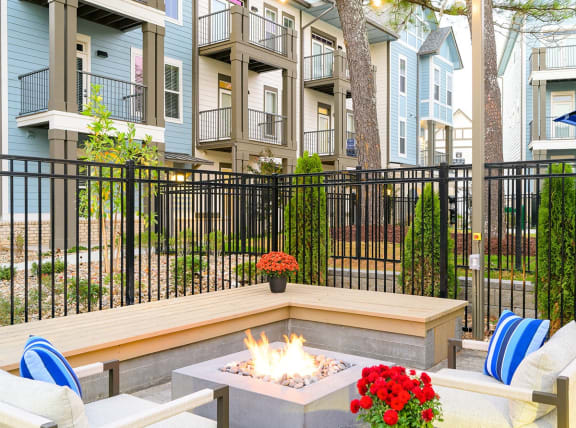 the preserve at ballantyne commons fire pit with chairs and a table  at Oakbrook Townhomes, Tennessee, 37067