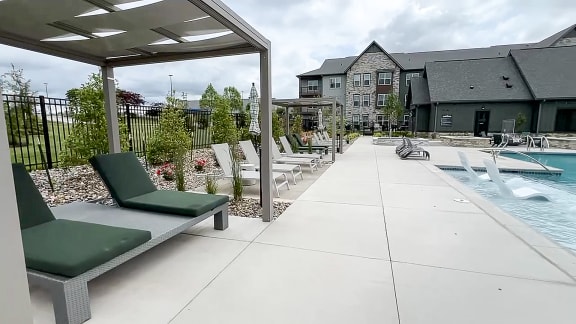 our apartments have a large pool and lounge chairs at The Depot, Raymore, 64083