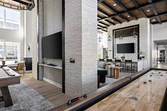 A room with a pool table and a television at Standard441 Luxury Apartments, Florida