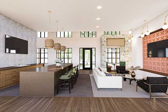 A modern living room with a white sofa, a wooden floor, and a TV mounted on the wall at Verity Luxury Apartment Homes Apartments, Vero Beach, FL 32960