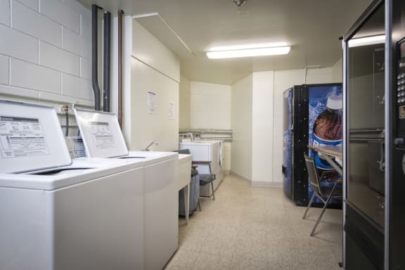 Modern Laundry Room at 1310 Archibald Apartments, Winnipeg, MB, R2J 0Z4