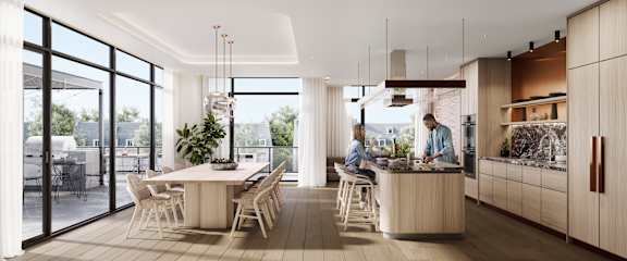 A modern kitchen with a dining table and chairs.
