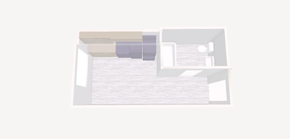 A white room with a bed and a chair.