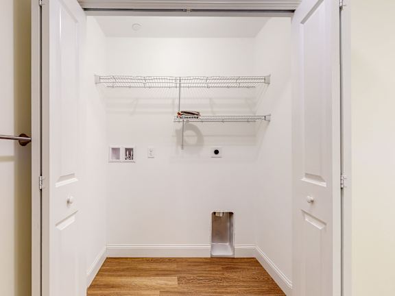Walk-in closet with wire shelving and pet door at Autumn Woods Apartments, Westbrook, 04092