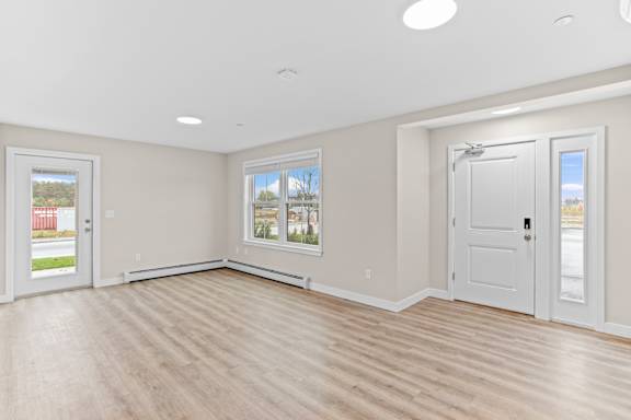 Living Room With Door To Patio &amp; Private Entrance