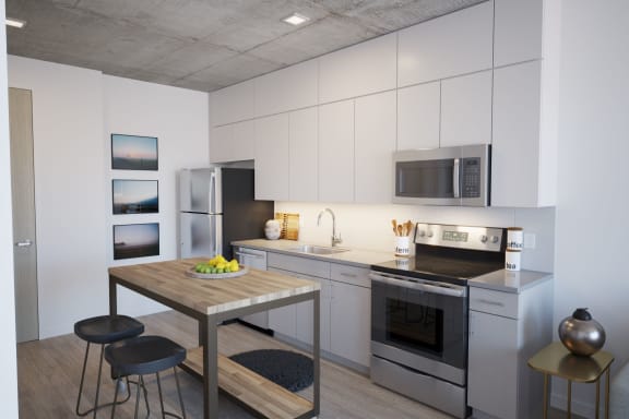 Fitted Kitchen With Island Dining at Linkt Apartments, Chicago