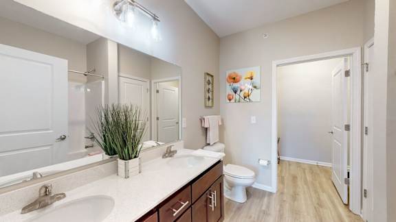 A bathroom with a white sink and toilet at The Slate, Jeffersonville, 47130