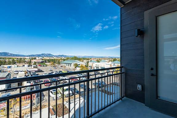 Balcony with view at Bridges at Flatiron, Broomfield, CO