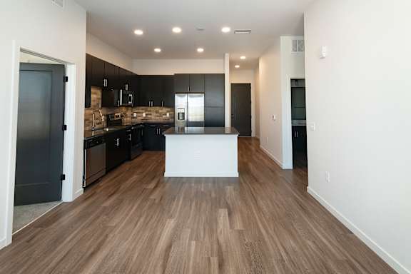Kitchen with White Island at Bridges at Flatiron, Broomfield, Colorado