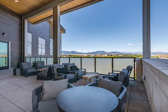 Patio with seating at Bridges at Flatiron, Broomfield, CO, 80021