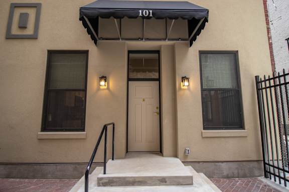 The front of a building with the number 101 on it.