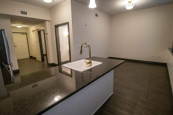 A bathroom with a sink and mirror.