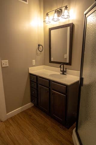 a bathroom with a sink and a mirror