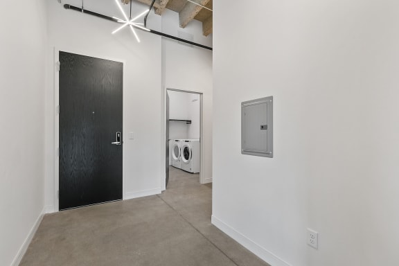 a laundry room with a washer and dryer
