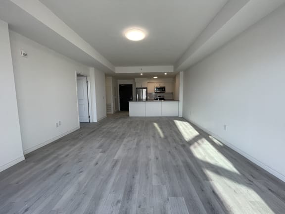 Bayfield Tower Apartments 1 bedroom 1 bathroom variation D living room looking towards kitchen