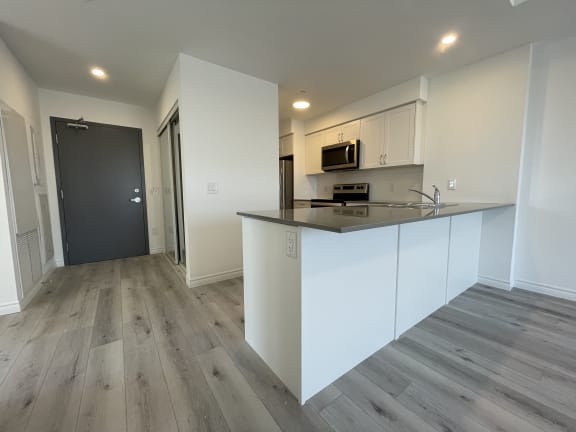 Bayfield Tower Apartments 1 bedroom 1 bathroom variation E kitchen with entry seen in the left side background