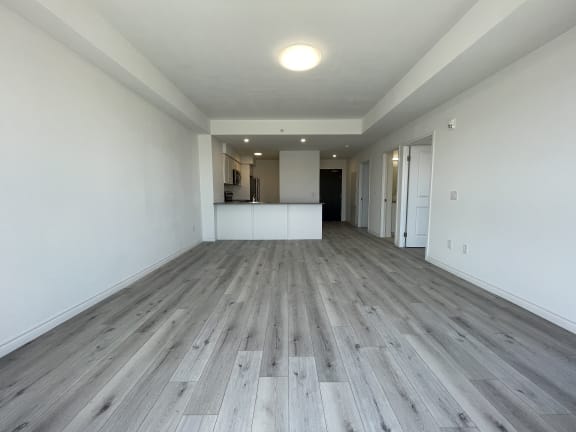 Bayfield Tower Apartments 2 bedroom 1 bathroom variation B living room with kitchen in the background