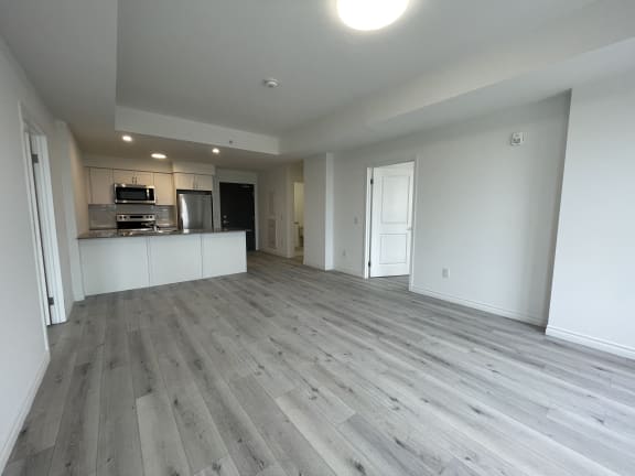 Bayfield Tower Apartments 2 bedroom 2 bathroom variation A living area with open-concept kitchen