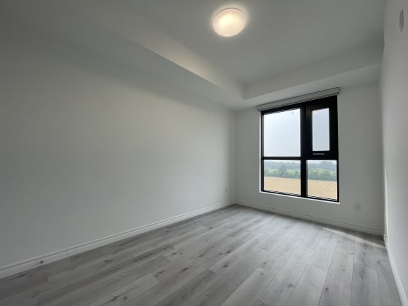 Bayfield Tower 2 bedroom 2 bathroom variation A second bedroom with a large window