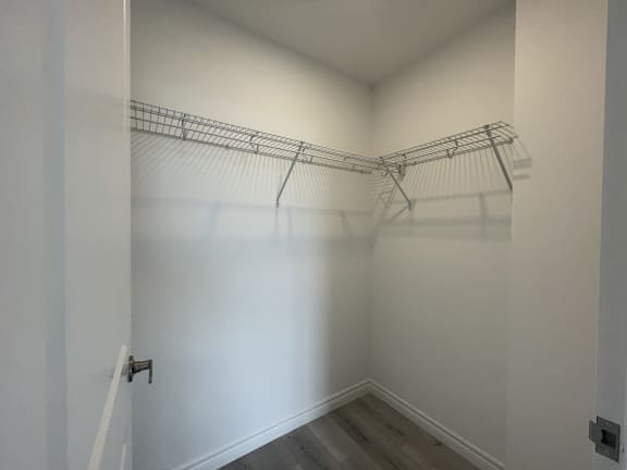 Bayfield Tower Apartments 2 bedroom 2 bathroom variation A walk in closet in primary bedroom
