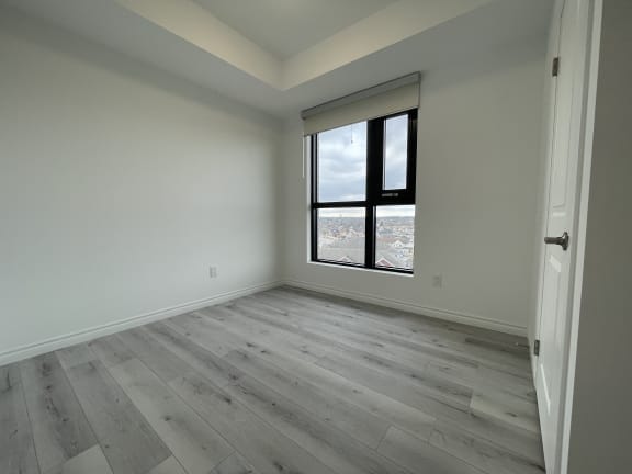Bayfield Tower Apartments 3 bedroom 2 bathroom variation A second bedroom with large window