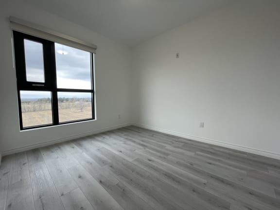 Bayfield Tower Apartments 3 bedroom 2 bathroom variation A third bedroom with a large window