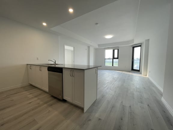 Bayfield Tower 2 bedroom 2 bathroom variation E open-concept kitchen and living room