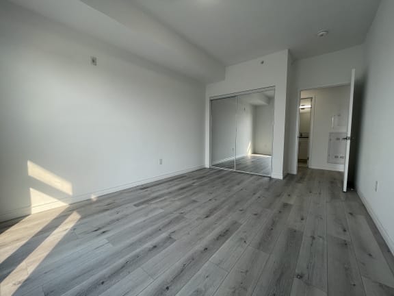 Bayfield Tower 2 bedroom 2 bathroom variation E second bedroom with double sliding mirrored door closet