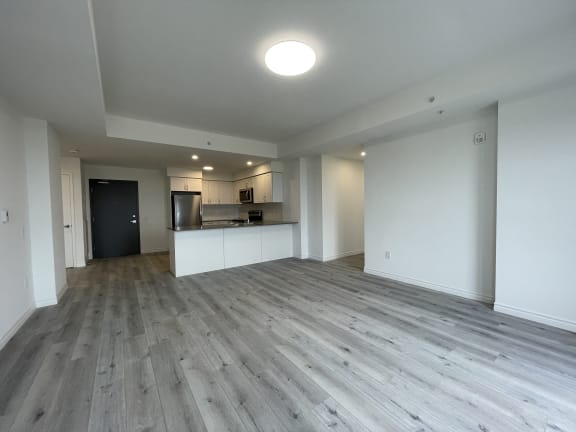 Bayfield Tower Apartments 3 bedroom 2 bathroom variation B living room and open-concept kitchen