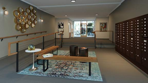 A modern living room with a wooden coffee table and a large circular wall art.