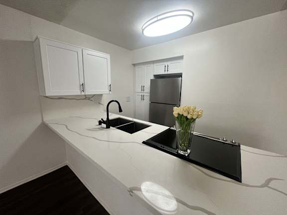 kitchen with white countertops