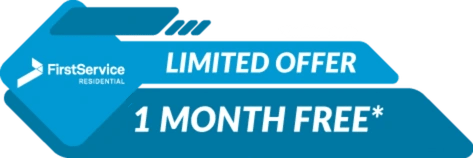 A blue arrow sign with the text "FirstService LIMITED OFFER 1 MONTH FREE*" on it.