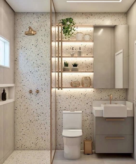 a bathroom with a toilet and a sink